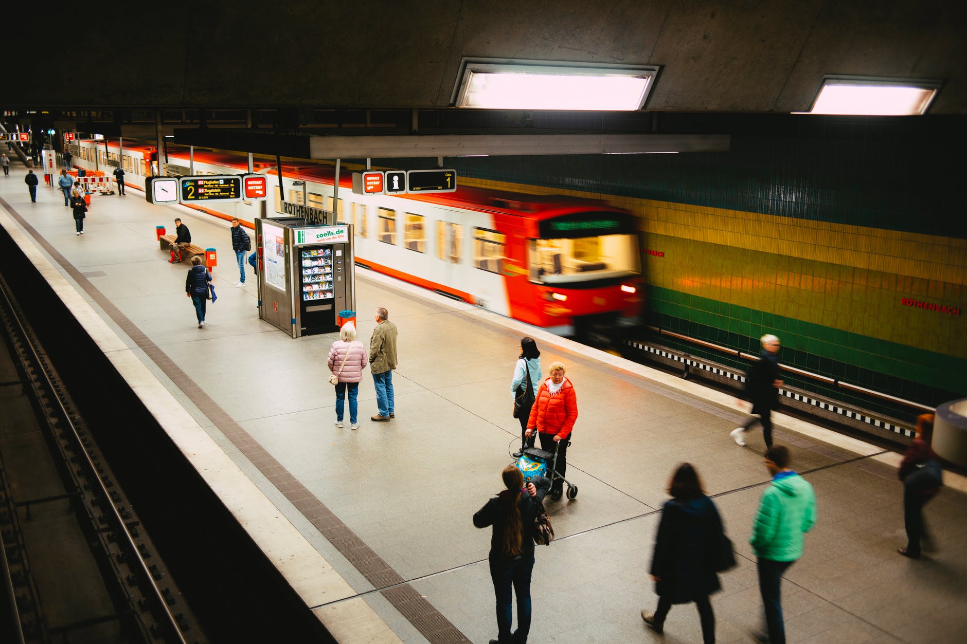 people walking on train station